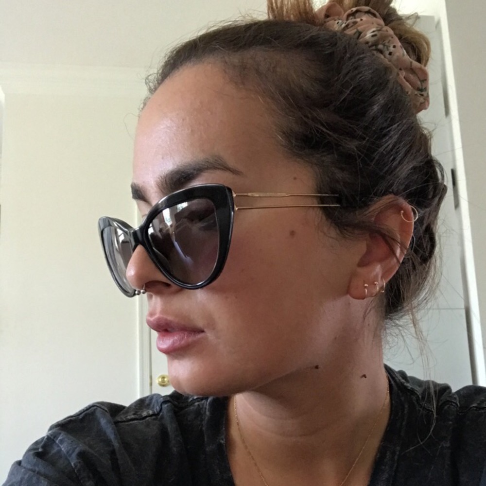 Miu Miu black cat eye sunglasses (MU 12RSA)